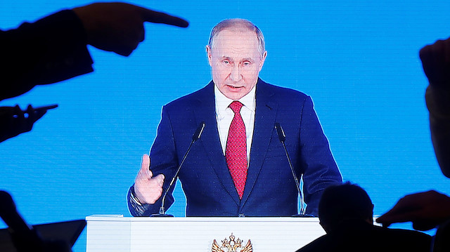 Russian President Vladimir Putin is seen on screen as he delivers his annual state of the nation address to the Federal Assembly in Moscow, Russia January 15, 2020. REUTERS/Maxim Shemetov TPX IMAGES OF THE DAY

