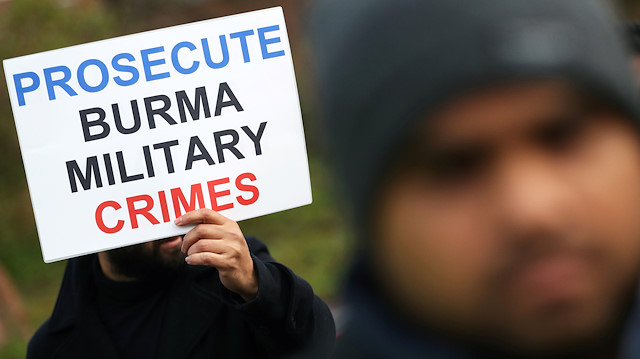 People demonstrate on the second day of hearings in a case filed by Gambia against Myanmar alleging genocide against the minority Muslim Rohingya population, outside the International Court of Justice (ICJ) in The Hague, Netherlands December 11, 2019. REUTERS/Yves Herman

