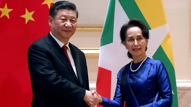 Chinese President Xi Jinping and Myanmar's State Counsellor Aung San Suu Kyi shake hands at the Presidential Palace in Naypyitaw, Myanmar January 17, 2020.