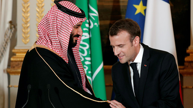 FILE PHOTO: French President Emmanuel Macron and Saudi Arabia's Crown Prince Mohammed bin Salman attend a press conference at the Elysee Palace in Paris, France, April 10, 2018. Yoan Valat/Pool via Reuters/File Photo

