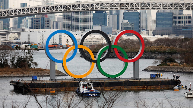 Giant Olympic Rings are installed at the waterfront area, with the Rainbow Bridge in the background, ahead of an official inauguration ceremony, six months before the opening of the Tokyo 2020 Summer Olympic Games, at Odaiba Marine Park in Tokyo, Japan January 17, 2020