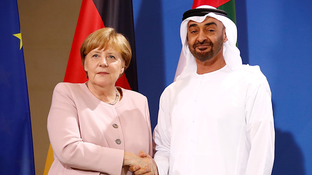 FILE PHOTO: German Chancellor Angela Merkel and Abu Dhabi's Crown Prince Mohammed bin Zayed al Nahyan shake hands after a news conference at the Chancellery in Berlin, Germany, June 12, 2019
