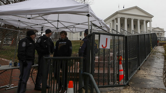 Law enforcement manage a security checkpoint to access the Virginia State Capitol grounds ahead of a gun rights advocates and militia members rally in Richmond, Virginia, U.S., January 18, 2020. REUTERS/Jim Urquhart

