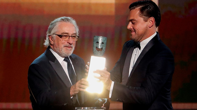 26th Screen Actors Guild Awards - Show - Los Angeles, California, U.S., January 19, 2020 - Robert De Niro accepts the Life Achievement Award from presenter Leonardo DiCaprio. REUTERS/Mario Anzuoni TPX IMAGES OF THE DAY

