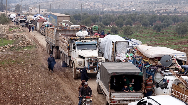 File photo:  Civilians flee Idlib de-escalation zone