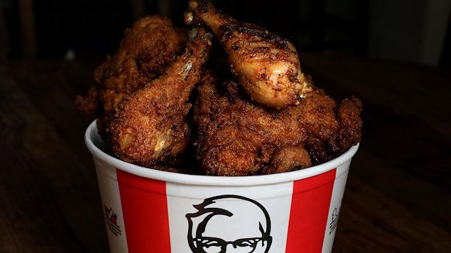 FILE PHOTO: A Kentucky Fried Chicken (KFC) bucket of mixed fried and grilled chicken is seen in this picture illustration taken April 6, 2017. REUTERS/Carlo Allegri/File Photo

