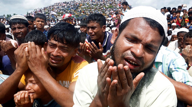 FILE PHOTO: Rohingya refugees take part in a prayer as they gather to mark the second anniversary of the exodus at the Kutupalong camp in Cox’s Bazar, Bangladesh, August 25, 2019. 