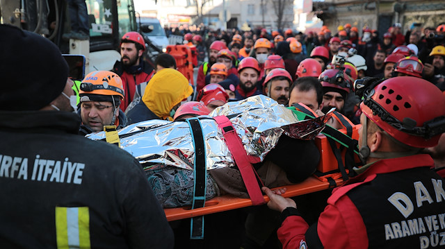 A woman was rescued on Saturday from the rubble of a collapsed house 17 hours after a powerful earthquake hit eastern Turkey