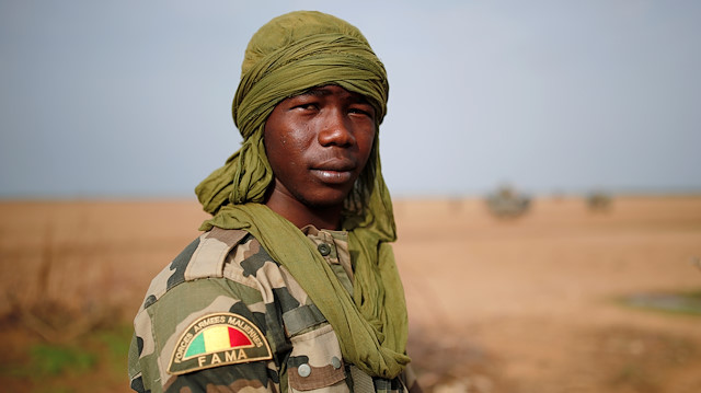 A young Malian Armed Forces (FAMa) soldier poses for a photo during Operation Barkhane