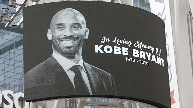 An image of Kobe Bryant is shown on a large screen outside the Staples Center after the retired Los Angeles Lakers basketball star was killed in a helicopter crash, in Los Angeles, California, U.S. January 26, 2020. REUTERS/Monica Almeida

