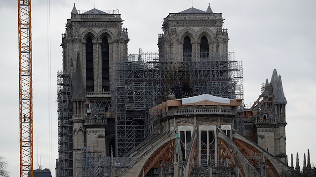 FILE PHOTO: General view shows the Notre Dame Cathedral, as works continue to stabilise the cathedral's structure nine months after a fire caused significant damage, in Paris, France, December 23, 2019. REUTERS/Gonzalo Fuentes/File Photo