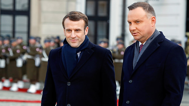 French President Emmanuel Macron and Polish President Andrzej Duda attend the welcoming ceremony in Warsaw, Poland February 3, 2020.