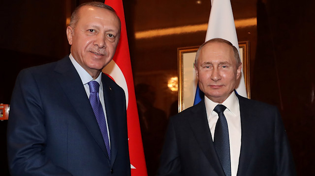 Turkish President Tayyip Erdogan meets with his Russian counterpart Vladimir Putin in Berlin, Germany, January 19, 2020. Murat Cetinmuhurdar/Turkish Presidential Press Office/Handout