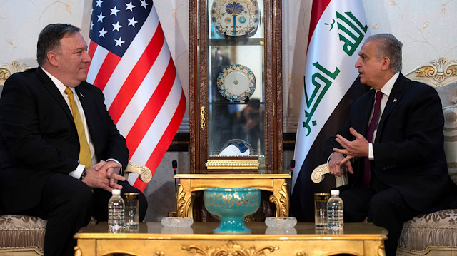 US Secretary of State Mike Pompeo talks with Iraqi Foreign Minister Mohamed Ali al-Hakim in Baghdad, Iraq, during a Middle East tour, January 9, 2019.