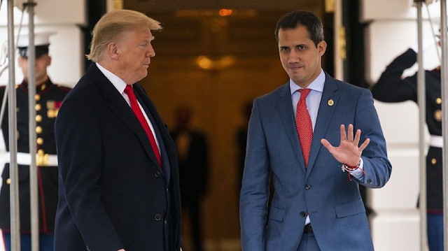 ABD Başkanı Donald Trump ile Venezuela'da kendini geçici devlet başkanı ilan eden muhalif lider Juan Guaido