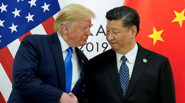 FILE PHOTO: U.S. President Donald Trump meets with China's President Xi Jinping