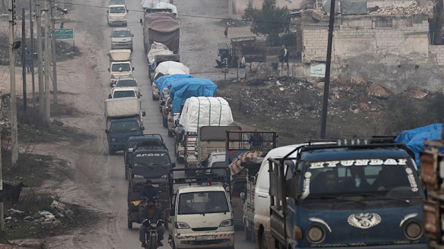 FILE PHOTO: A view of the trucks carrying belongings of displaced Syrians, in northern Idlib, Syria January 30, 2020. Picture taken January 30, 2020