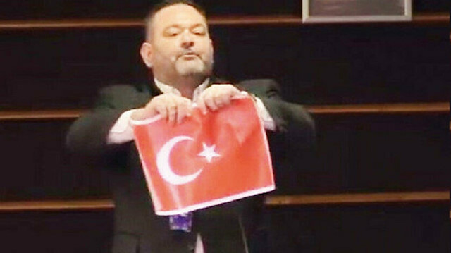 File photo: Ioannis Lagos tears apart a Turkish flag