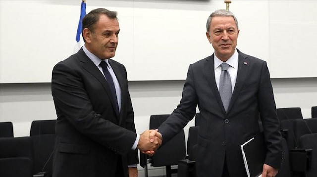 Turkish Defense Minister Hulusi Akar and his Greek counterpart Nikos Panagiotopoulos