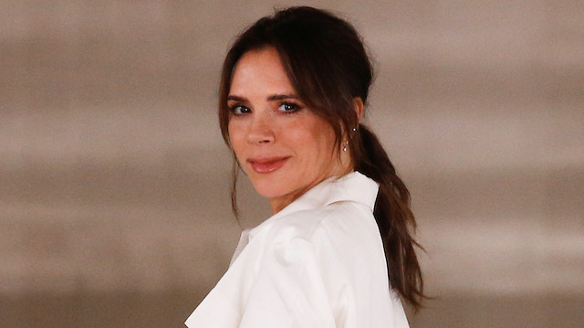 Designer Victoria Beckham at the end of her catwalk show during London Fashion Week in London, Britain, February 16, 2020. REUTERS/Henry Nicholls

