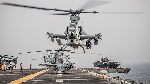 An AH-1Z Viper from Marine Medium Tiltrotor Squadron (VMM) 163 (Reinforced), 11th Marine Expeditionary Unit (MEU) prepares for take-off aboard the amphibious assault ship USS Boxer (LHD 4) as it transits the Strait of Hormuz, off Oman, in this picture released by U.S. Navy on August 12, 2019. Dalton S. Swanbeck/U.S. Navy/Handout via REUTERS ATTENTION EDITORS- THIS IMAGE HAS BEEN SUPPLIED BY A THIRD PARTY.

