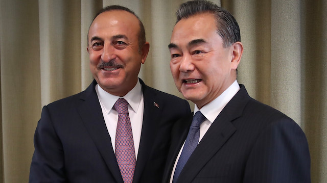 Mevlut Cavusoglu and Wang Yi 