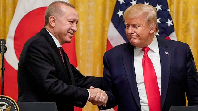 FILE PHOTO: U.S. President Donald Trump greets Turkey's President Tayyip Erdogan during a joint news conference at the White House in Washington, U.S., November 13, 2019. REUTERS/Joshua Roberts/File Photo

