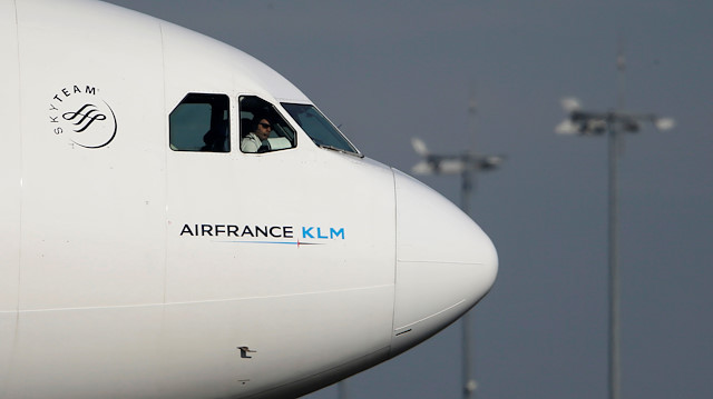 File photo: FILE PHOTO: An Air France pilot looks on as he taxis his Boeing 777 aircraft after landing at the Charles de Gaulle International Airport in Roissy, near Paris, October 27, 2015