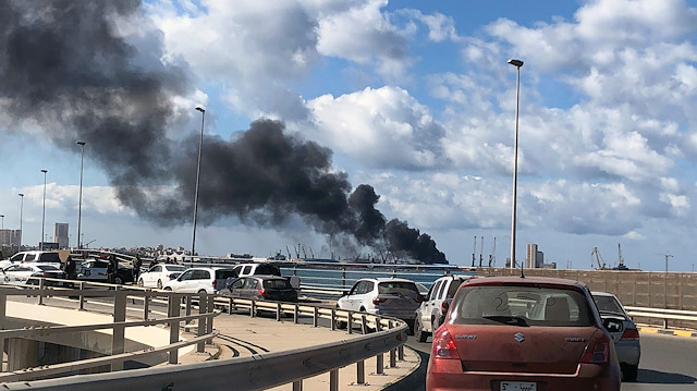 A smoke rises from a port of Tripoli after being attacked in Tripoli, Libya February 18, 2020.