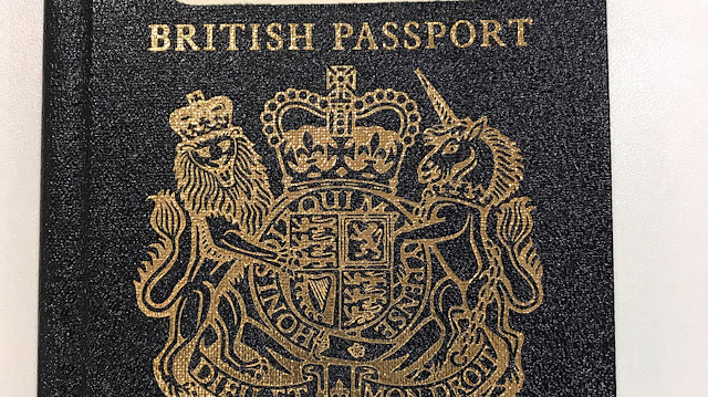 File photo: A classic blue United Kingdom passport is seen in this photo illustration received via Britain's Home Office, in London Britain December 22, 2017. Home Office/Crown 