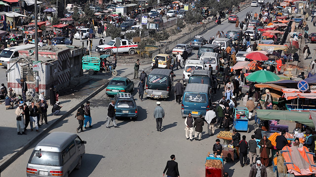 Vehicles drive on a crowded road in Kabul, Afghanistan 