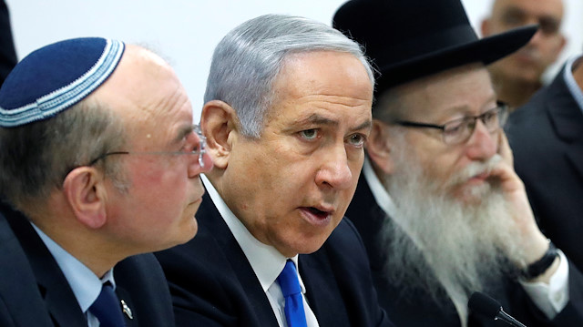Israeli Prime Minister Benjamin Netanyahu holds a situation assessment meeting with Health Minister Yaakov Litzman (R) regarding the novel coronavirus, at the Health Ministry in Tel Aviv, Israel February 23, 2020.