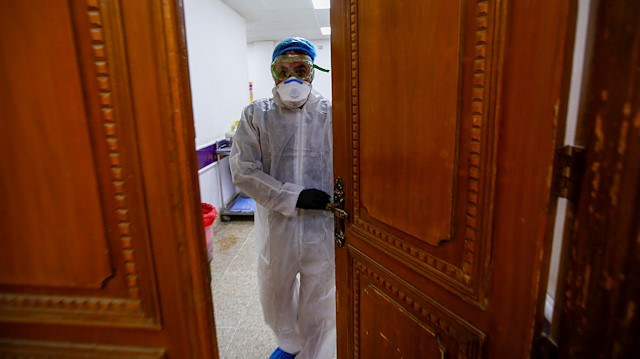 File photo: A member of medical staff is seen at a quarantine room of a hospital, following the outbreak of the new coronavirus, in the holy city of Najaf, Iraq February 24, 2020