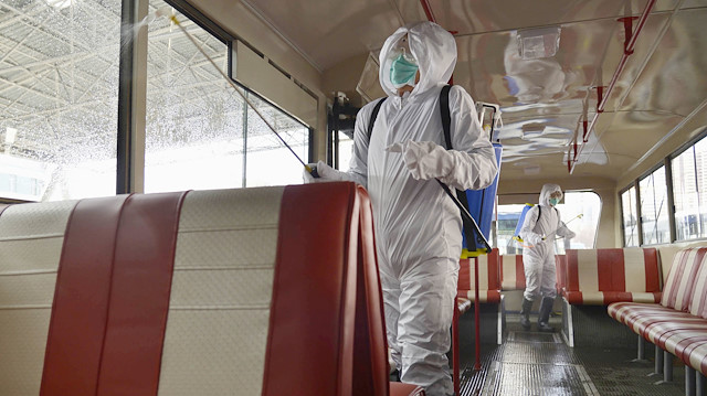 File photo: A trolley bus is disinfected amid fears over the spread of the novel coronavirus in Pyongyang, North Korea, in this photo taken on February 22, 2020 and released by Kyodo February 23, 2020. Picture taken February 22, 2020