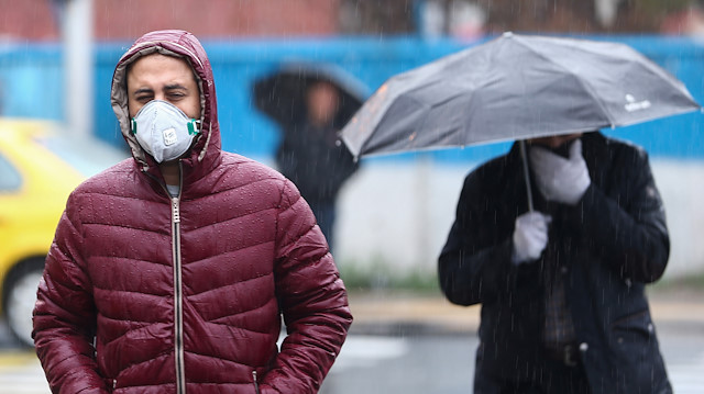 File photo: An Iranian man wears protective mask to prevent contracting coronavirus, as he walks in the street in Tehran, Iran February 25, 2020. WANA (West Asia News Agency)/Nazanin Tabatabaee via REUTERS ATTENTION EDITORS - THIS IMAGE HAS BEEN SUPPLIED BY A THIRD PARTY.

