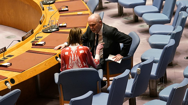 Turkish ambassador to the United Nations Feridun Sinirlioglu speaks with U.S. Ambassador to the United Nations Kelly Craft alone following a Security Council meeting about the situation in Syria at United Nations Headquarters 

