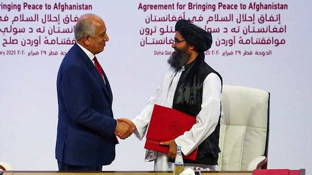 File photo: Mullah Abdul Ghani Baradar, the leader of the Taliban delegation, and Zalmay Khalilzad, U.S. envoy for peace in Afghanistan, shake hands after signing an agreement at a ceremony between members of Afghanistan's Taliban and the U.S. in Doha, Qatar February 29, 2020