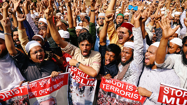 Muslims shout slogans as they protest the violence against Muslims in India and Indian Prime Minister Narendra Modi's scheduled visit to Bangladesh in Dhaka, Bangladesh, February 28, 2020.