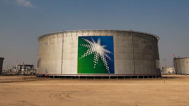 A view shows branded oil tanks at Saudi Aramco oil facility in Abqaiq, Saudi Arabia.