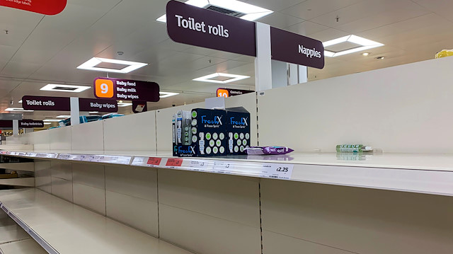Empty shelves of toilet paper are seen are seen at a supermarket, as the number of coronavirus cases grow around the world, in London, Britain March 13, 2020.