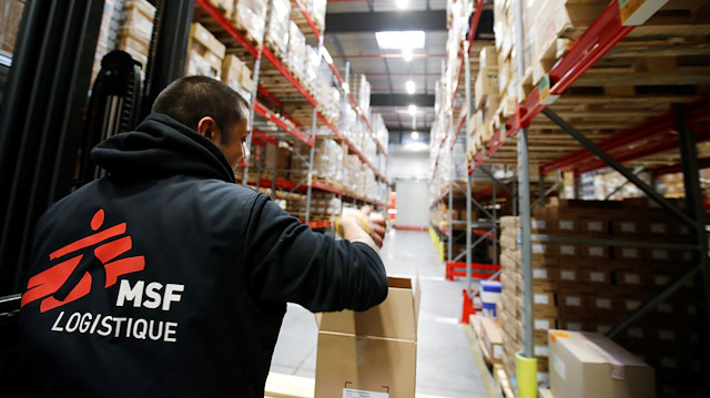 File photo :The logo of Medecins Sans Frontieres (MSF - Doctors Without Borders) is seen on the back of an employee at the international medical humanitarian organisation MSF logistique centre in Merignac near Bordeaux, France, December 6, 2018