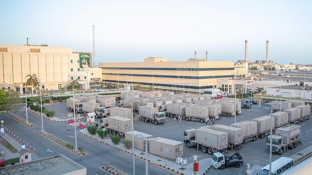 Medical vehicles to be used as field hospital, are seen at the parking of the King Fahad Hospital