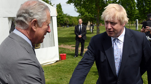 Britain's Prince Charles chats to Britain'sPM Boris Johnson
