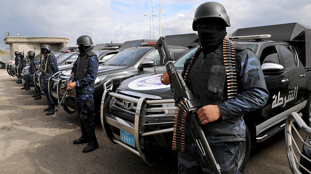 Central security support force carry weapons during the security deployment in the Tajura neighborhood, east of Tripoli, Libya January 14, 2020. REUTERS/Ismail Zitouny  