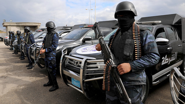 Central security support force carry weapons during the security deployment in the Tajura neighborhood, east of Tripoli, Libya January 14, 2020. REUTERS/Ismail Zitouny

