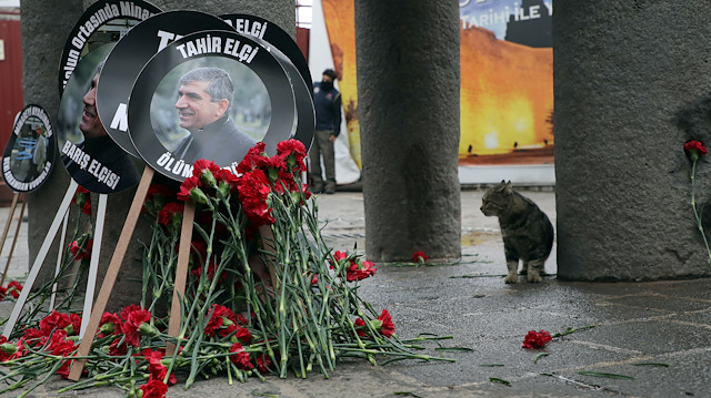 Carnations and pictures of Diyarbakir Bar Association President Tahir Elci are seen during a commemoration on the fourth anniversary of his death from gunshot wounds, in Sur district in Diyarbakir, Turkey, November 28, 2019.