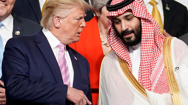 FILE PHOTO: U.S. President Donald Trump speaks with Saudi Arabia's Crown Prince 