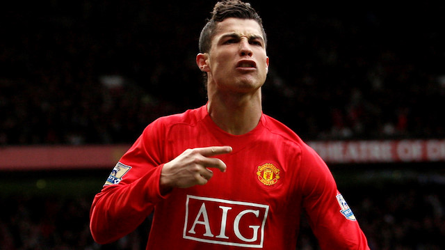 FILE PHOTO: ON THIS DAY -- March 23 March 23, 2008: SOCCER - Manchester United's Cristiano Ronaldo celebrates scoring his team's second goal in the 79th minute of their 3-0 victory over Liverpool in the Premier League. The Portuguese forward played a crucial role for his team with 31 league goals as they won a 10th Premier League title and 17th top division crown overall to sit one behind Liverpool's then record of 18. Ronaldo scored another eight goals in the Champions League as United won the title for their third European Cup, beating Chelsea on penalties in the final. Action Images via Reuters/Jason Cairnduff/File Photo

