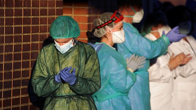 File photo: Medical staff of Severo Ochoa hospital applaud in support for healthcare workers, amid the coronavirus disease (COVID-19) outbreak, in Leganes, near Madrid, Spain April 1, 2020