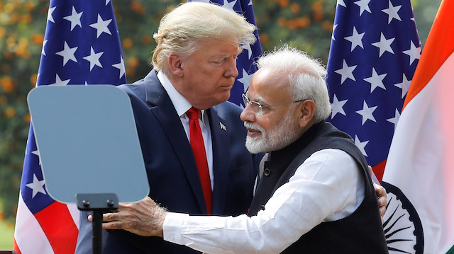 File photo: U.S. President Donald Trump and India's Prime Minister Narendra Modi embrace during a joint news conference after bilateral talks at Hyderabad House in New Delhi, India, February 25, 2020